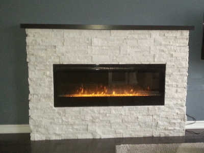 Dimplex wall mount electric fireplaces offer a modern sleek look and provide ambient heat. Installed fully recessed for a flush finish.